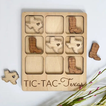 Texas-themed, wooden tic tac toe board with pieces shaped like cowboy boots and the state of Texas.