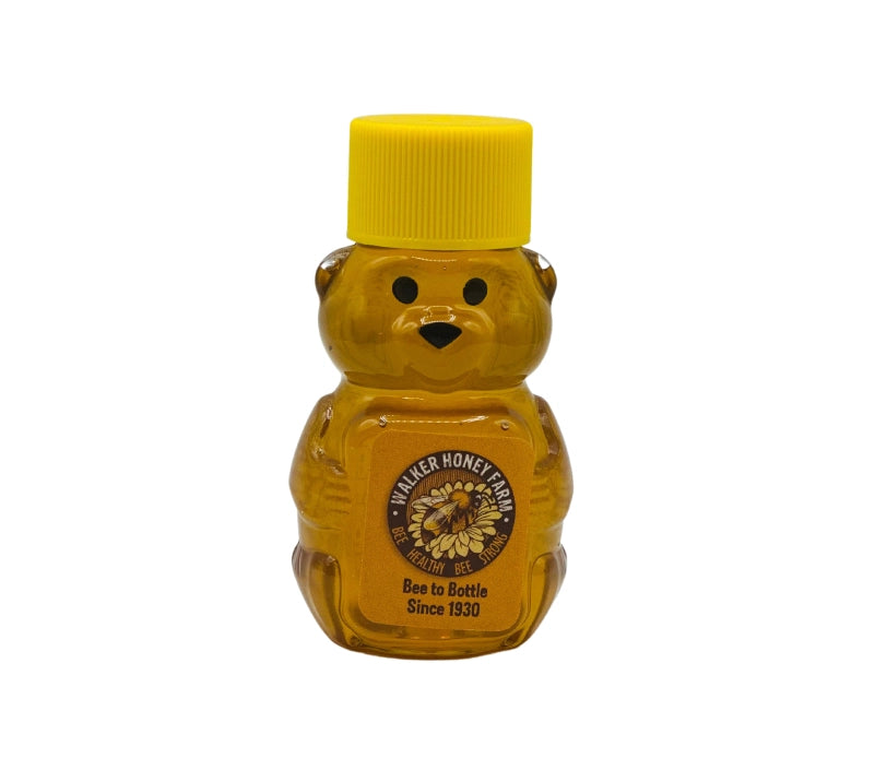 Jar of honey shaped like a bear – include in a custom gift box today.